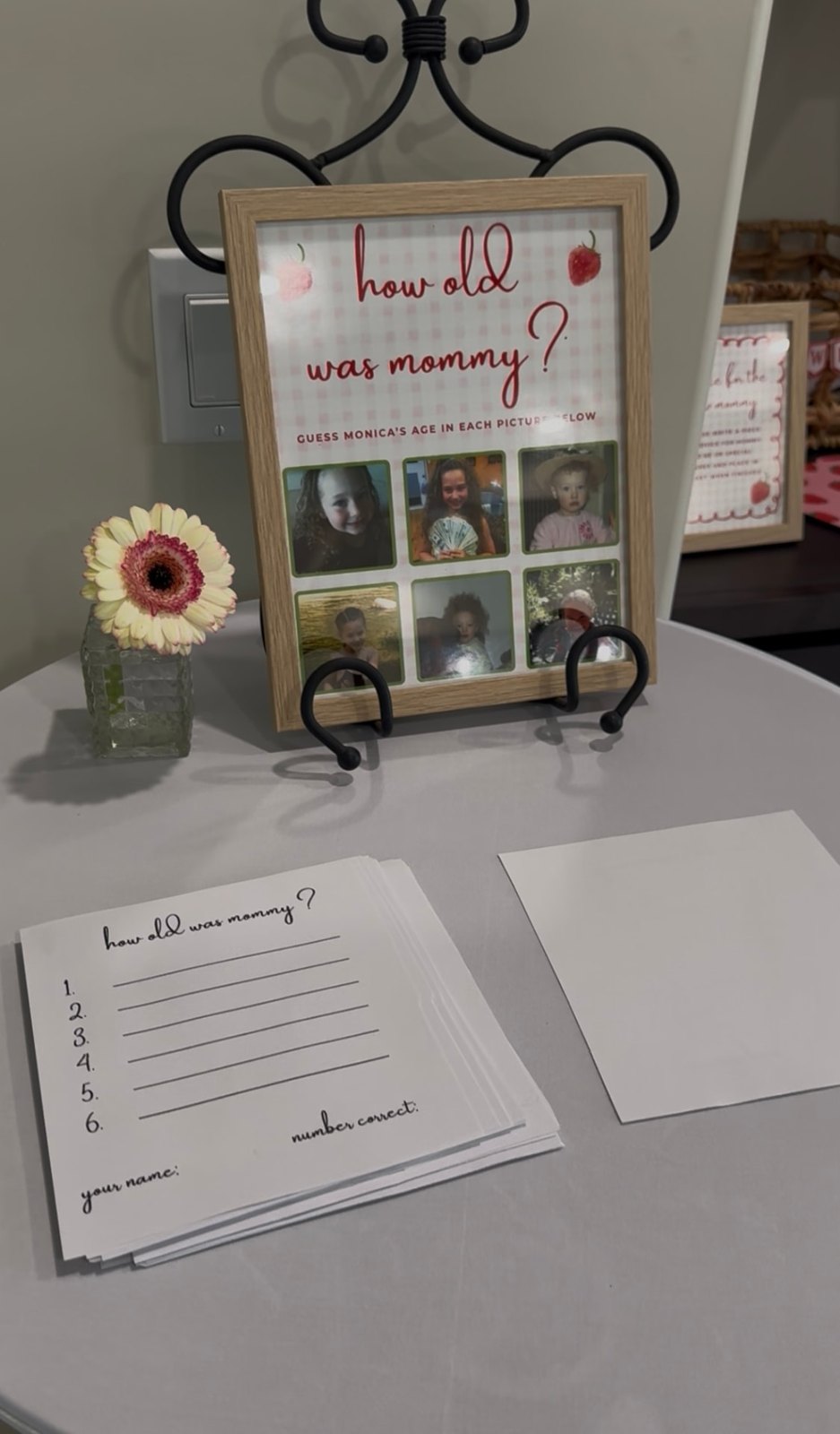 “How old was mommy?” guessing game with framed photos and answer cards