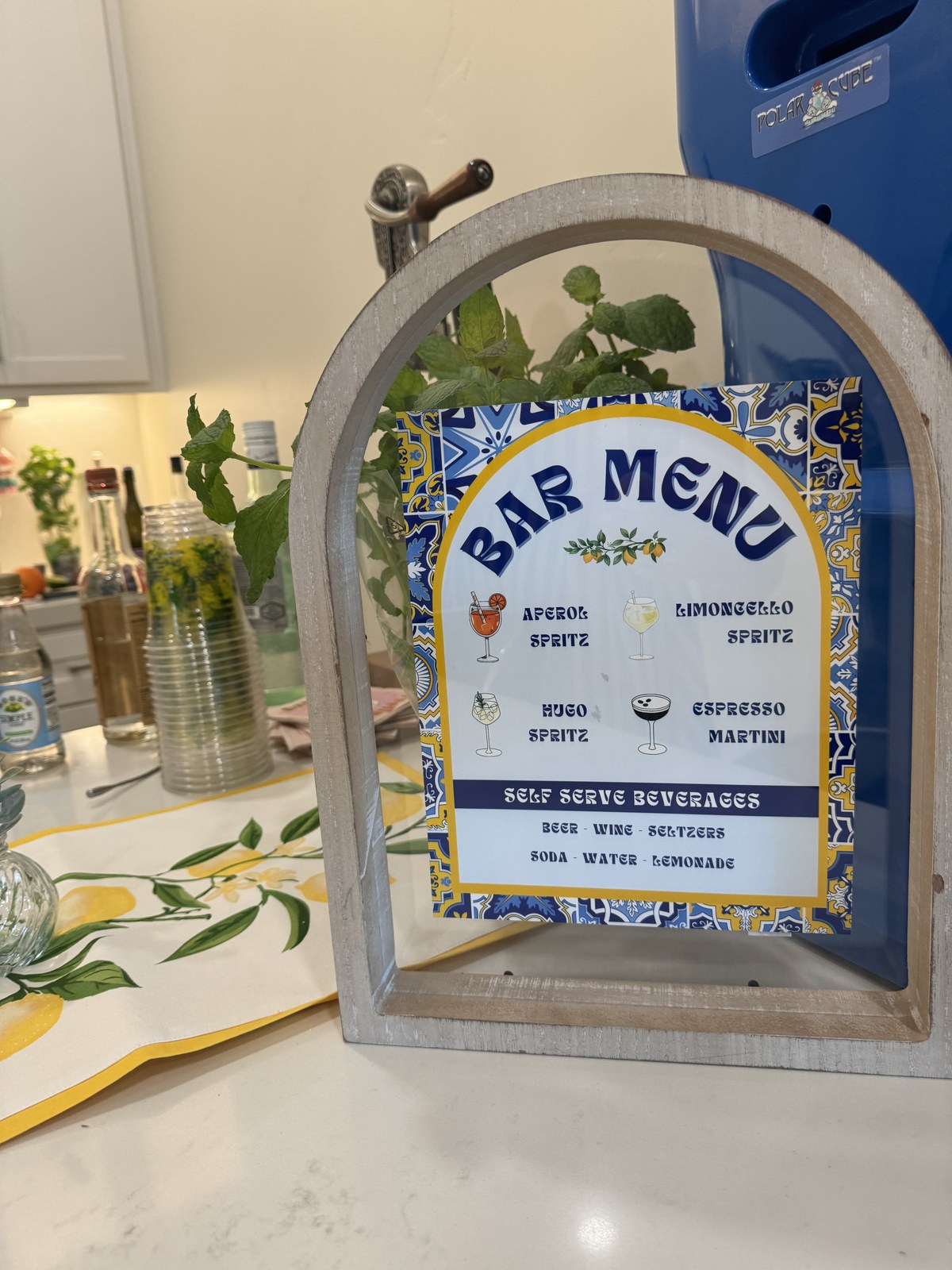 Italian-inspired bar menu sign with Aperol spritz, limoncello spritz and espresso martini